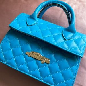 Light blue lowerider bag